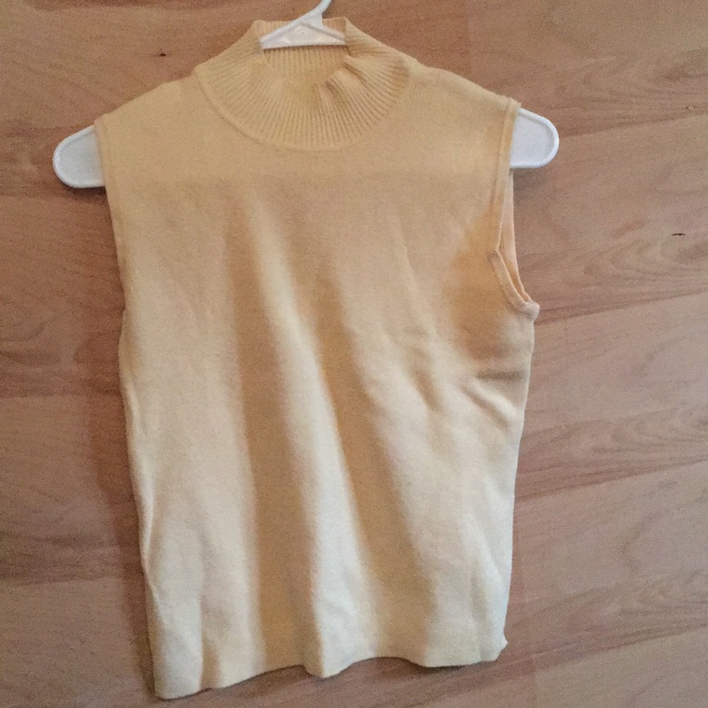 Pale yellow knit sleeveless mock turtleneck